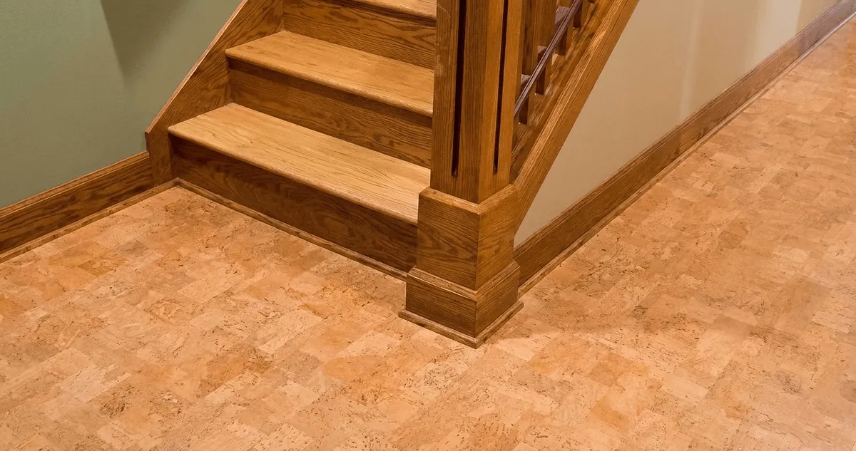 End of a staircase with cork flooring in Tulsa, OK